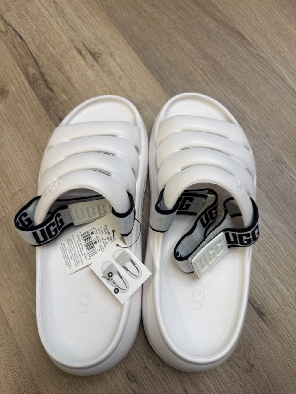 UGG White Slide Sandals with Black Branded Heel Straps